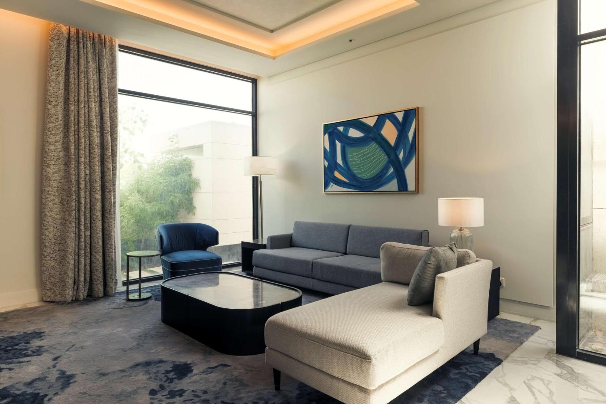 Mansard Riyadh, A Radisson Collection Hotel Exteriör bild A living room at the hotel
